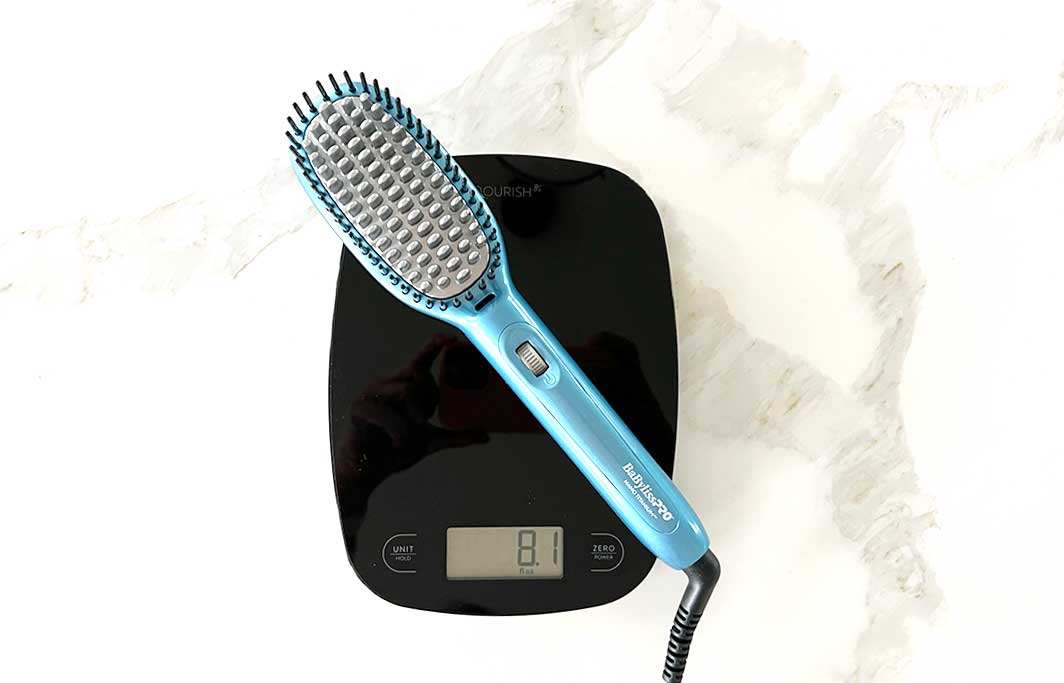 Babylisspro-Nano-Titanium-Paddle-Brush-weight